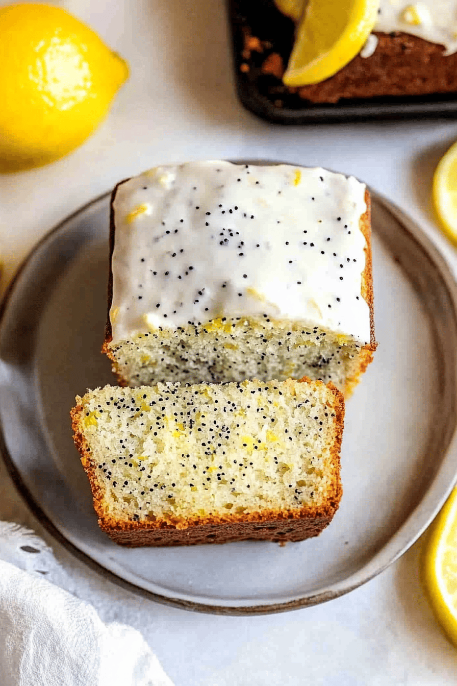 Lemon Poppy Seed Zucchini Bread slice on plate showing perfect texture and swirl pattern