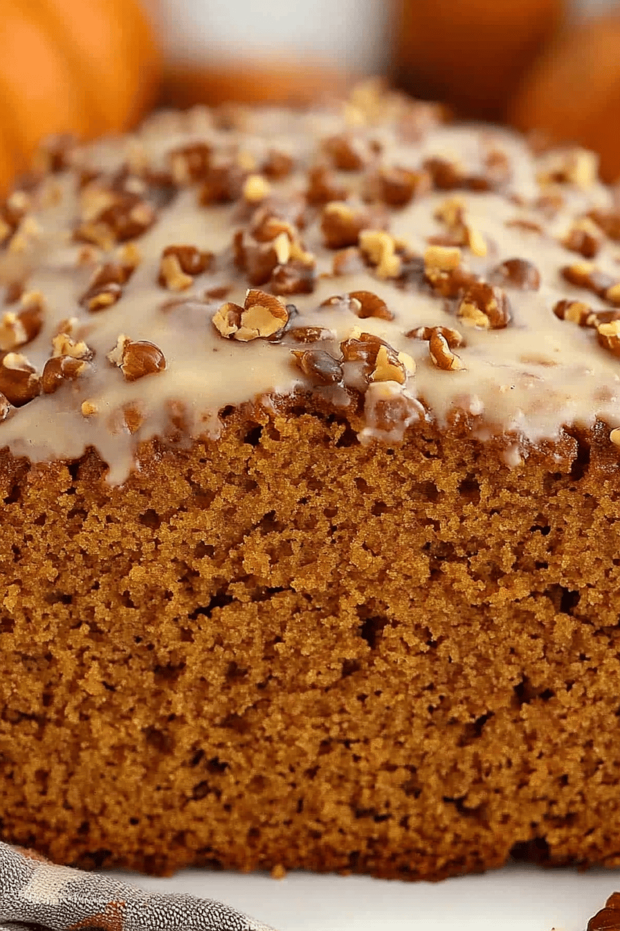 Maple Pumpkin Bread slice on plate showing perfect texture and swirl pattern