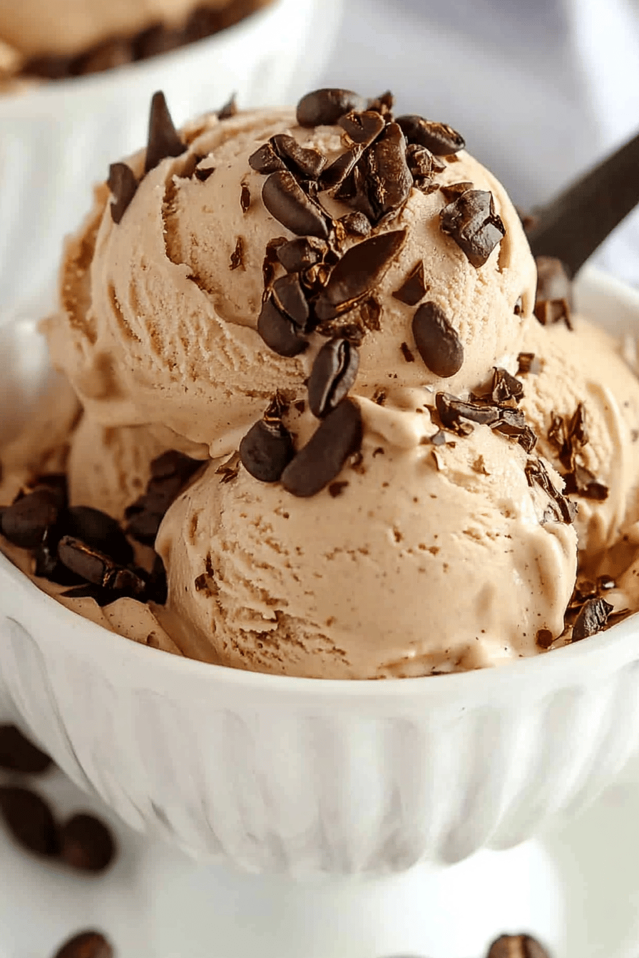 No-Churn Coffee Ice Cream slice on plate showing perfect texture and swirl pattern