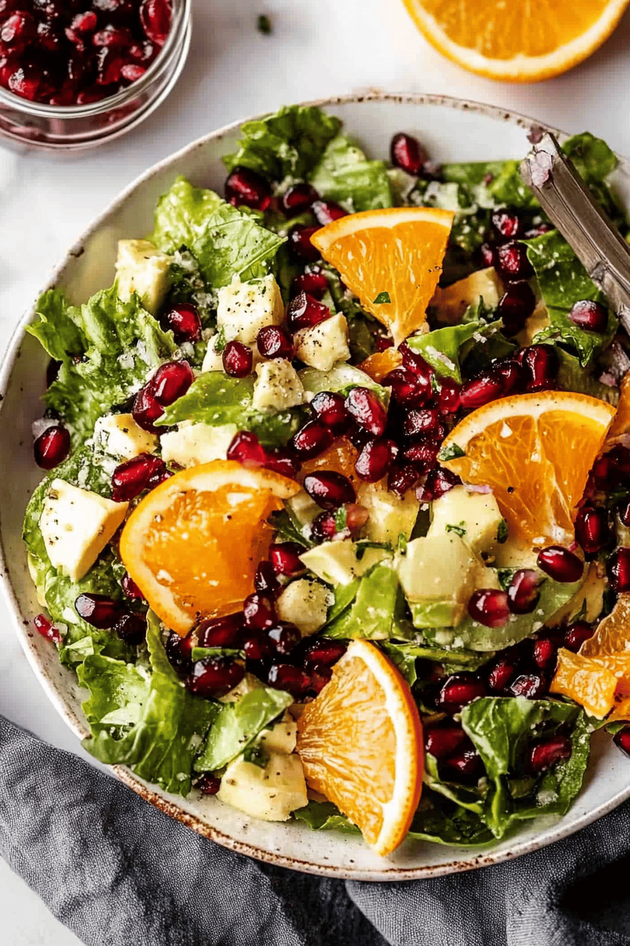 Orange Pomegranate Salad slice on plate showing perfect texture and swirl pattern