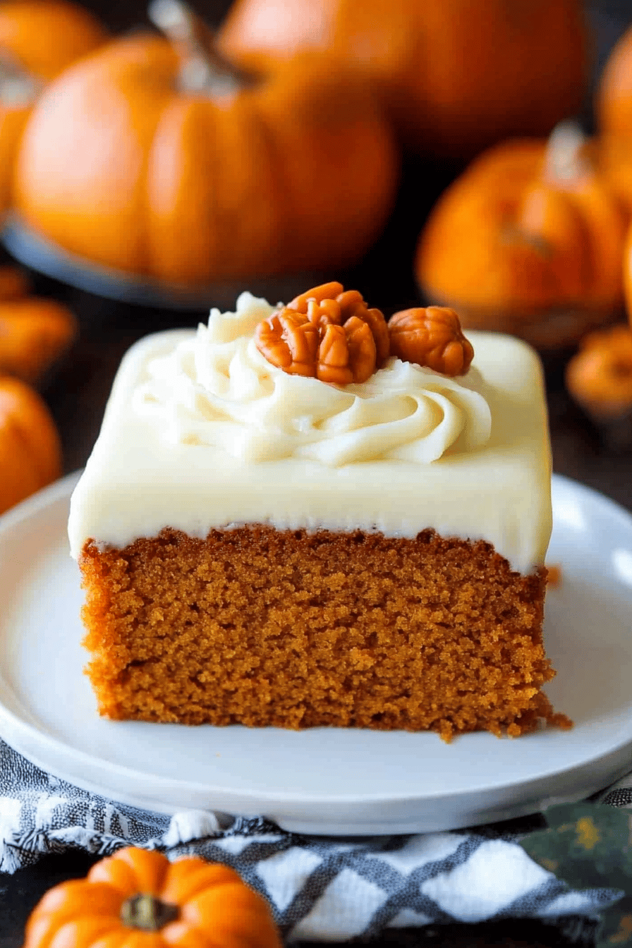 Pumpkin Cake Tips slice on plate showing perfect texture and swirl pattern