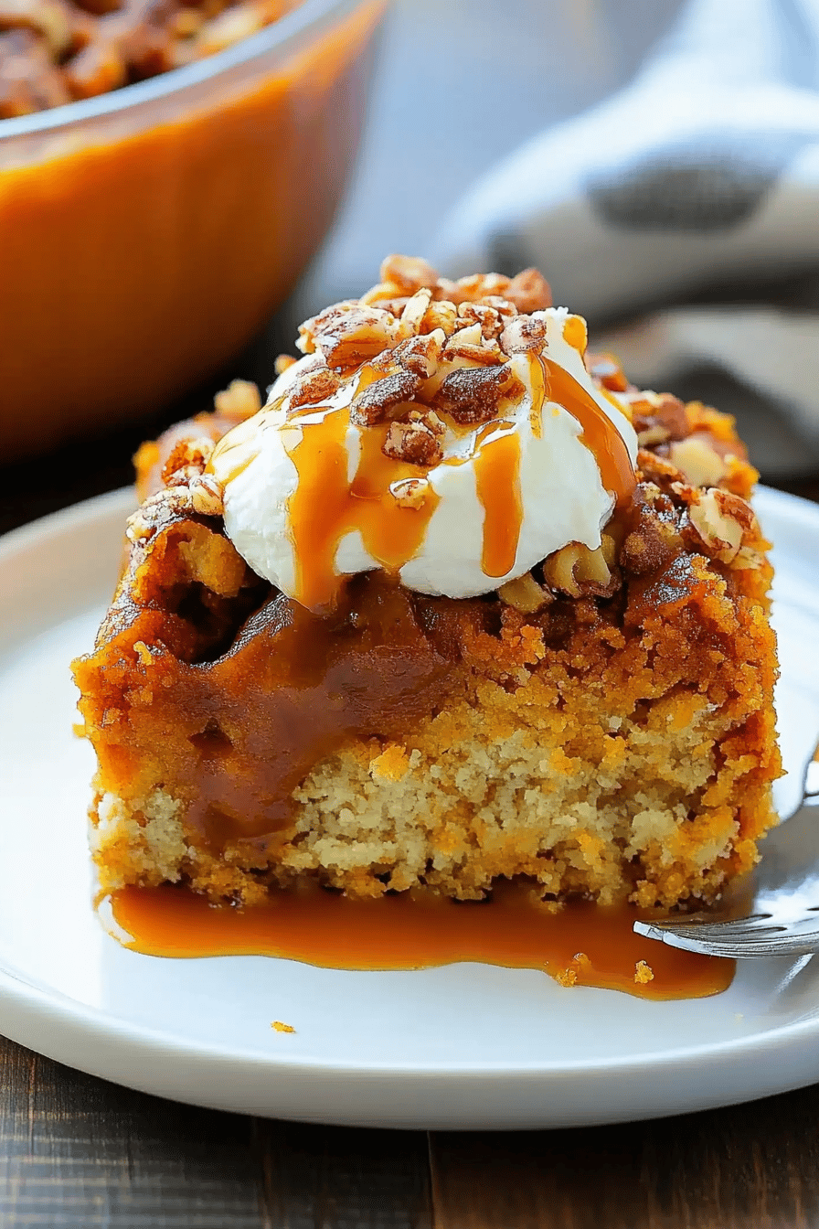 Pumpkin Dump Cake slice on plate showing perfect texture and swirl pattern